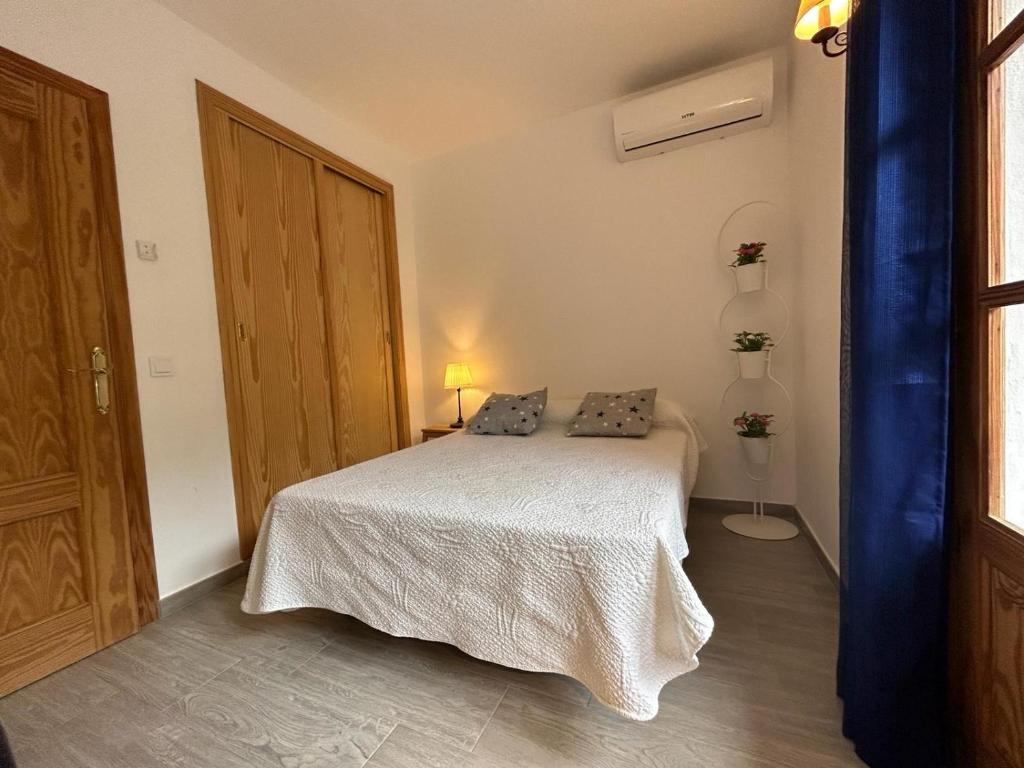 Postel nebo postele na pokoji v ubytování Villa Son Serra