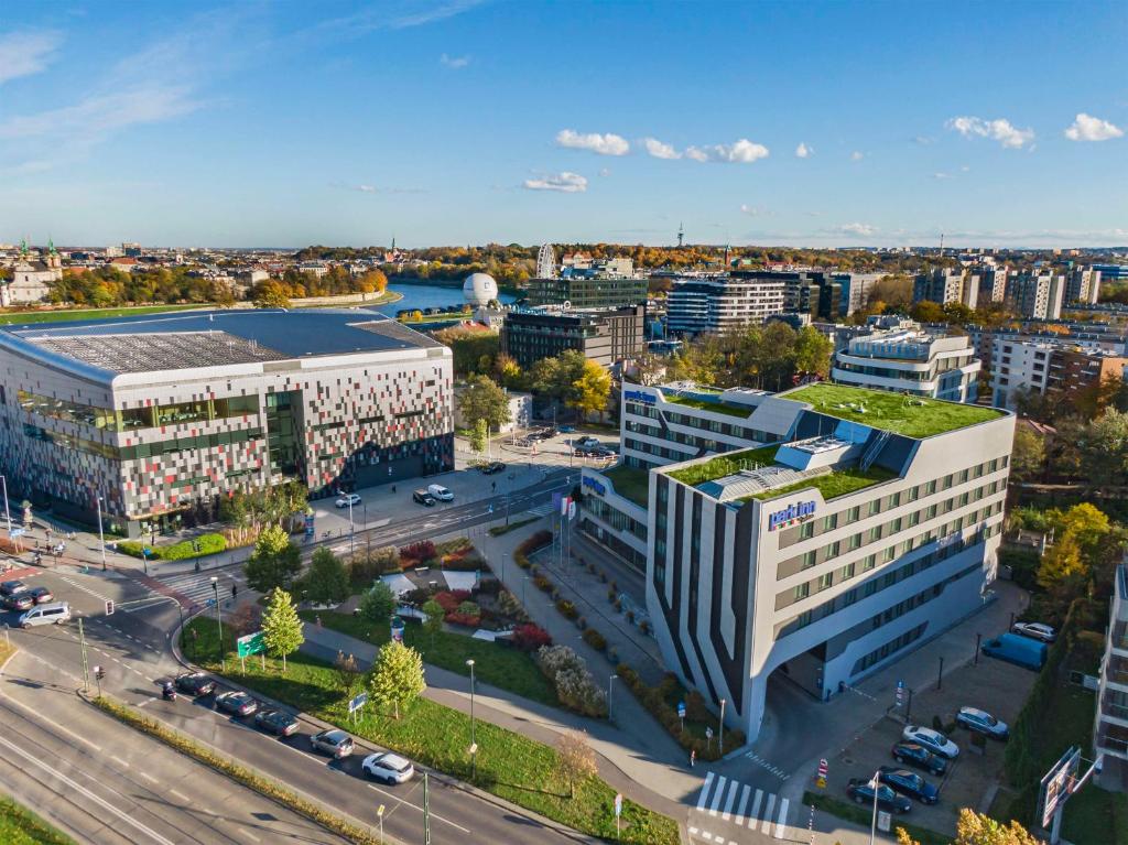 an aerial view of a city with buildings at Park Inn by Radisson Krakow in Krakow