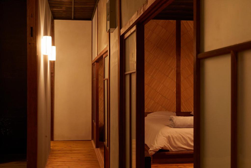 Postel nebo postele na pokoji v ubytování Lhotel de Mai