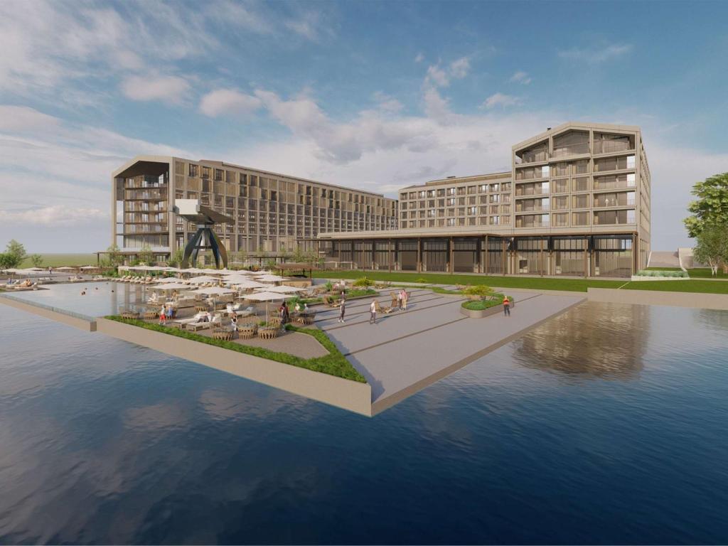 a rendering of a building with water in front at Rixos Tersane Istanbul in Istanbul