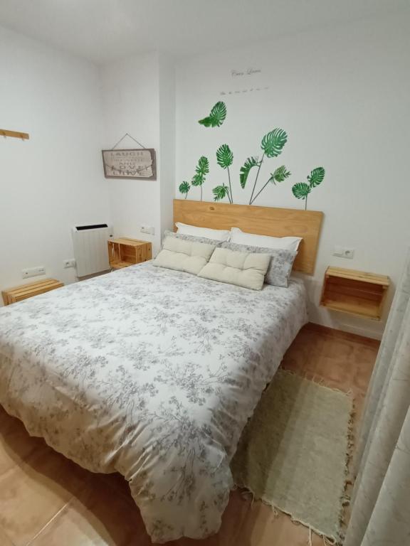 a bedroom with a large bed in a room at Casa Majo Valdelinares VUTE-23-002 in Valdelinares