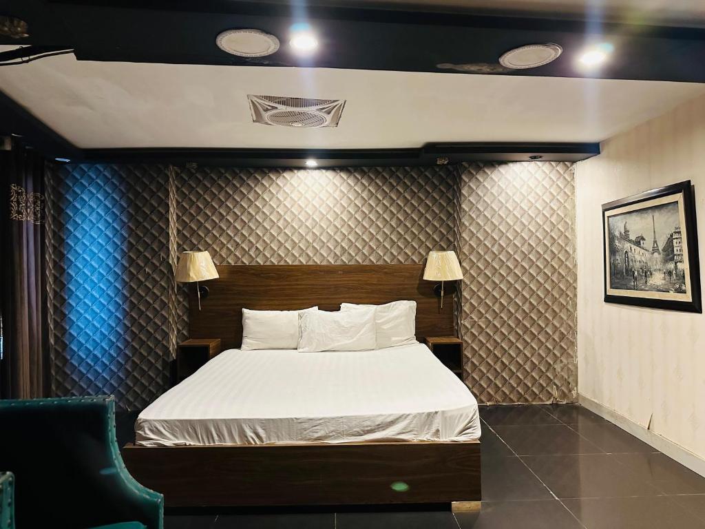 Postel nebo postele na pokoji v ubytování Hotel SeaView 2