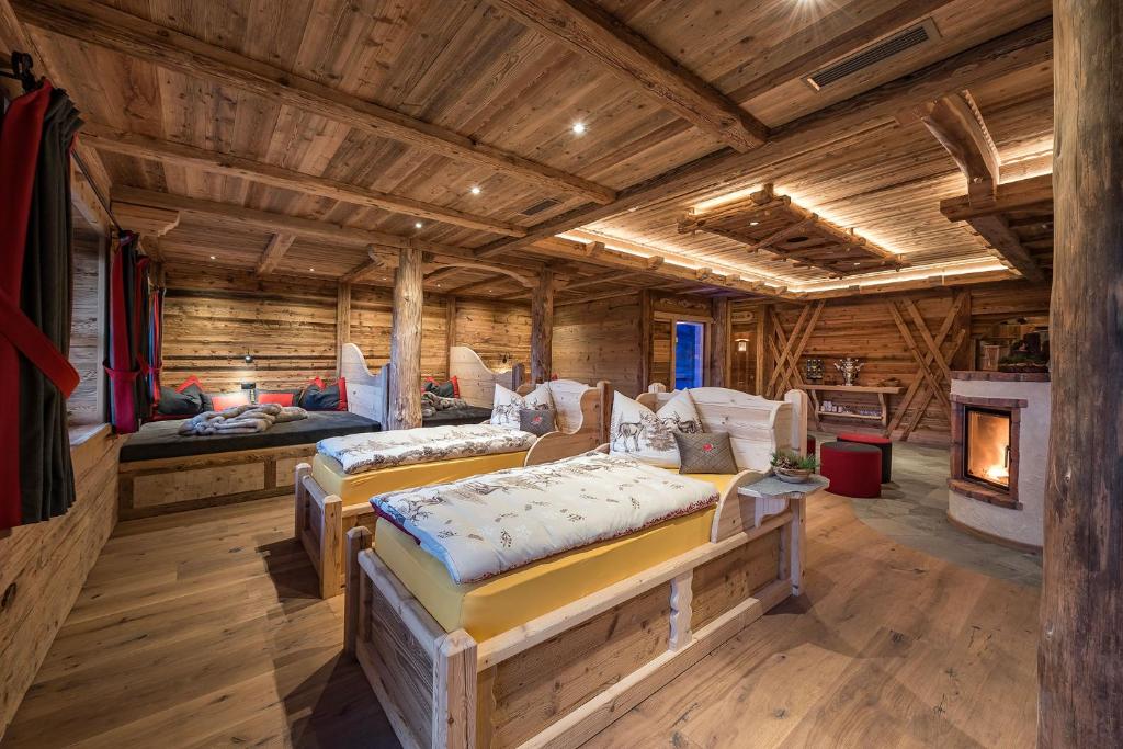 Postel nebo postele na pokoji v ubytování Chalets Almdorf Haidenberg
