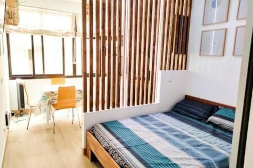Postel nebo postele na pokoji v ubytování Casita Canaria Blanca Amazing Loft by the Beach