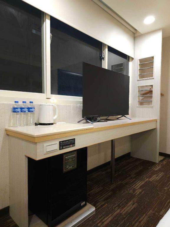 TV a/nebo společenská místnost v ubytování Hub Hotel Banqiao Branch