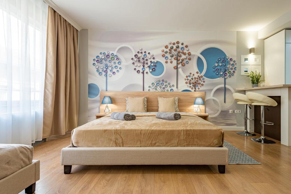 Postel nebo postele na pokoji v ubytování Budapest Holidays Apartments & Spa