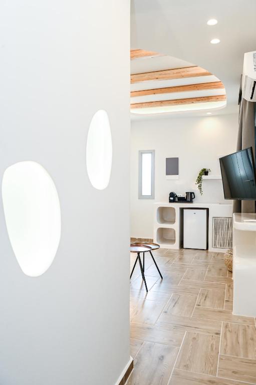 TV a/nebo společenská místnost v ubytování City Center Suites