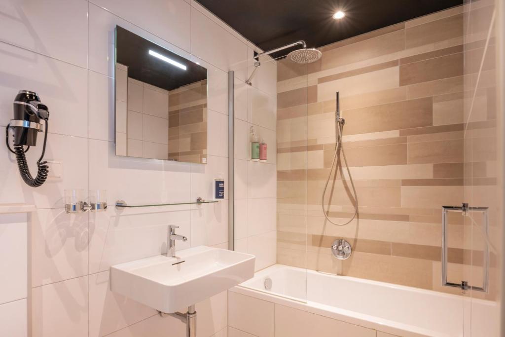 Koupelna v ubytování Thon Hotel Rotterdam City Centre