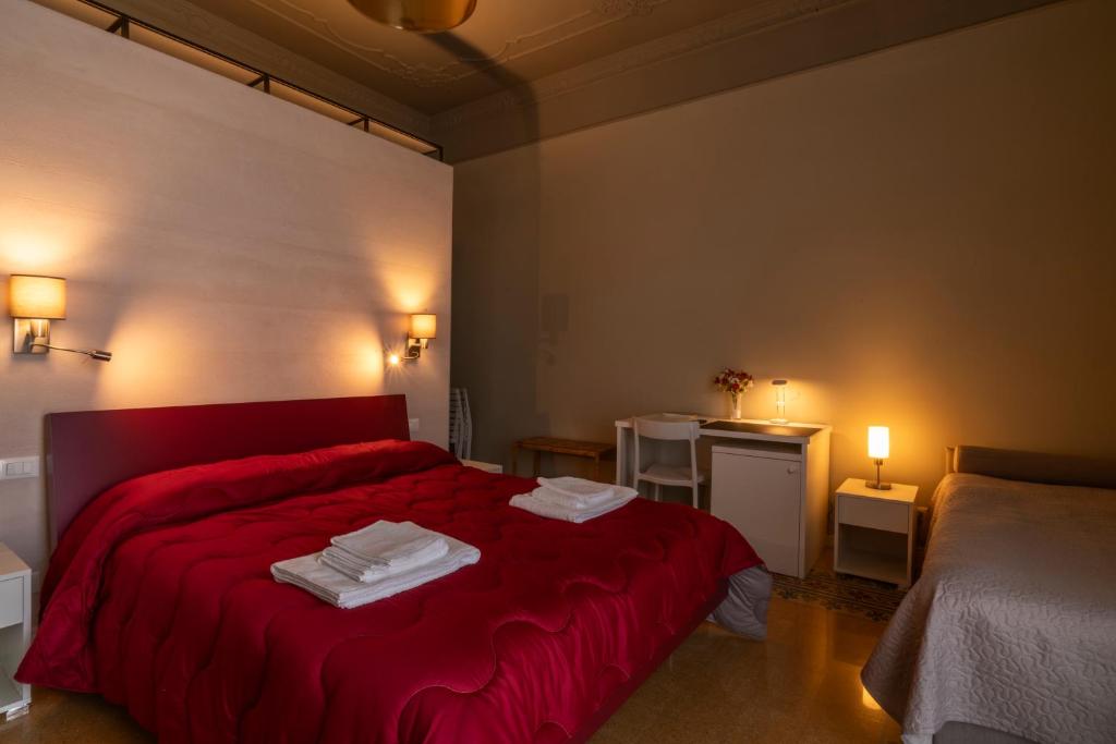 Postel nebo postele na pokoji v ubytování B&B Handy Palermo