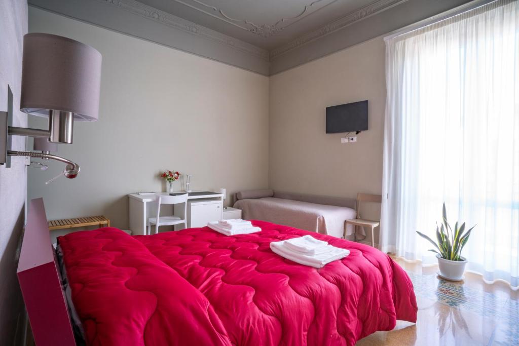Postel nebo postele na pokoji v ubytování B&B Handy Palermo