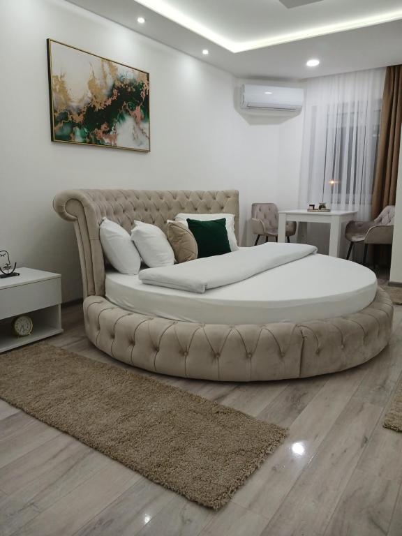 Postel nebo postele na pokoji v ubytování Apartmani Sofronic Loznica 2