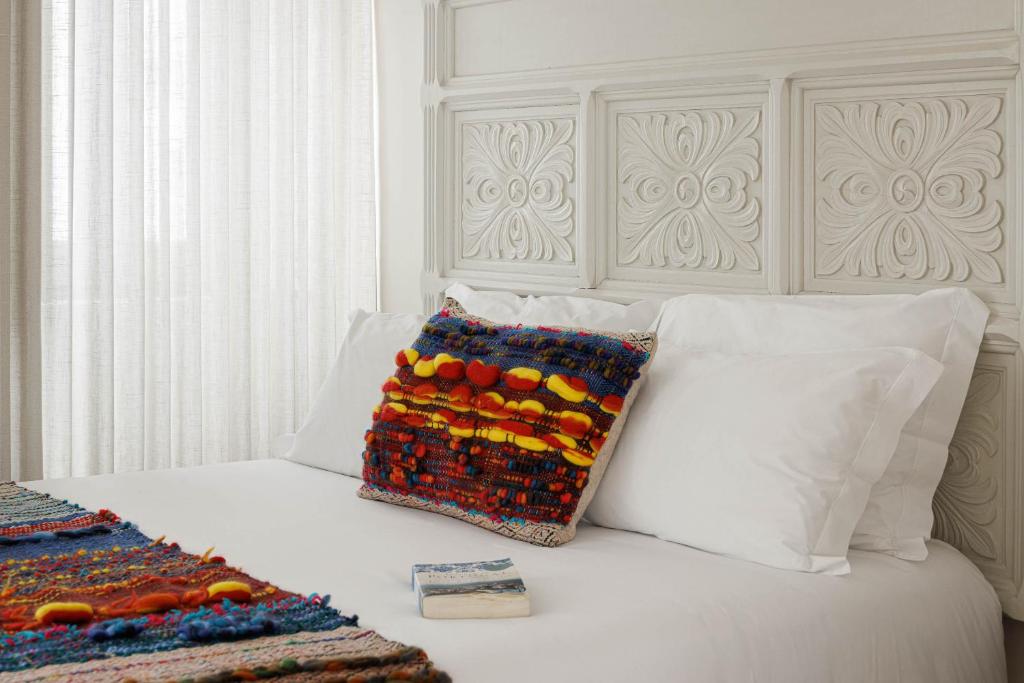 Postel nebo postele na pokoji v ubytování Story Studio Coimbra Centro - Culture