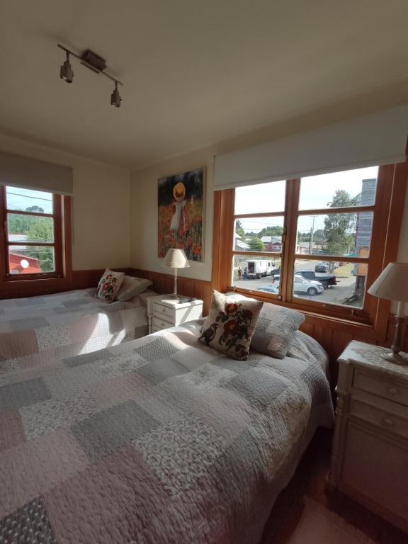 Postel nebo postele na pokoji v ubytování Casa Mia, Puerto Varas, habitación doble