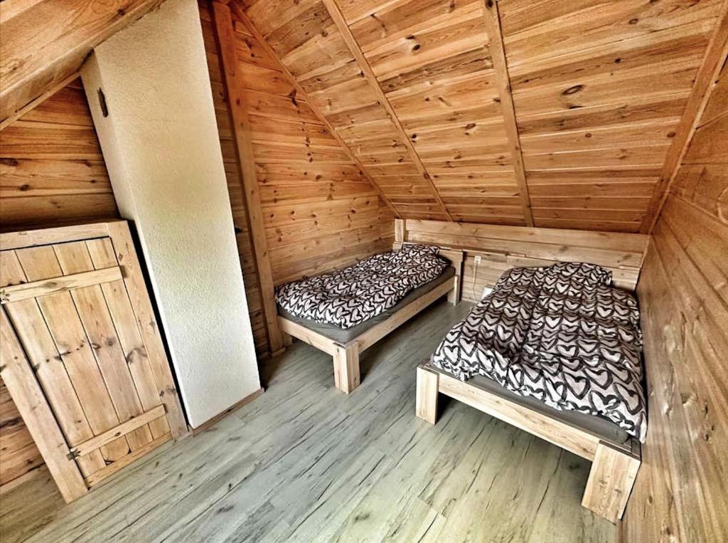 Postel nebo postele na pokoji v ubytování Sosenkowe Zacisze Wiele