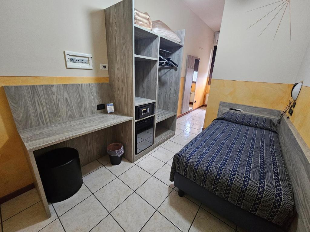 Postel nebo postele na pokoji v ubytování Hotel Euro