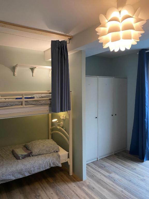 Postel nebo postele na pokoji v ubytování Bohobos Hostel