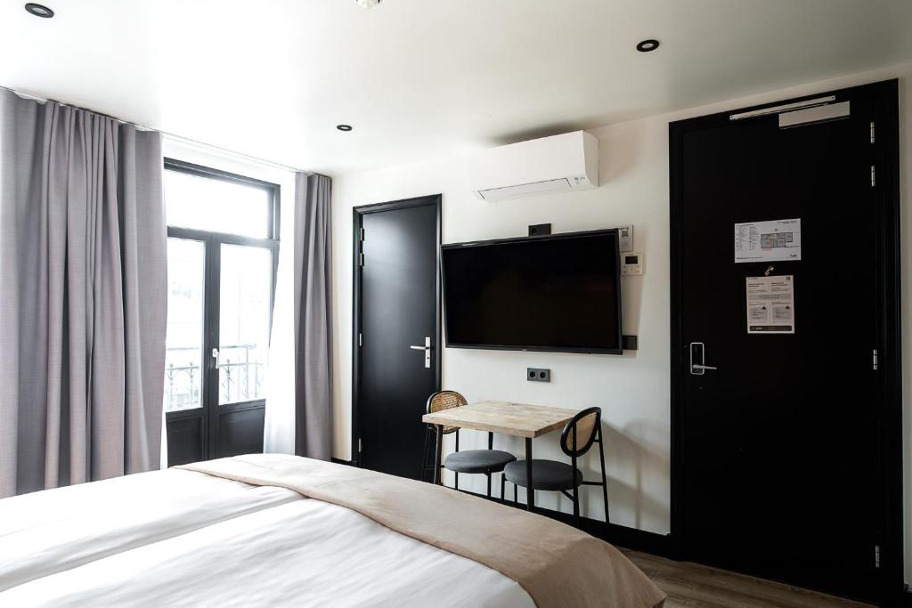 Limehome Amsterdam Leidsekruisstraat - Resim 36