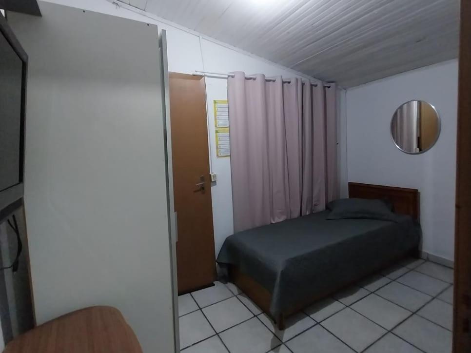 Cama o camas de una habitación en Kitnet Itapema