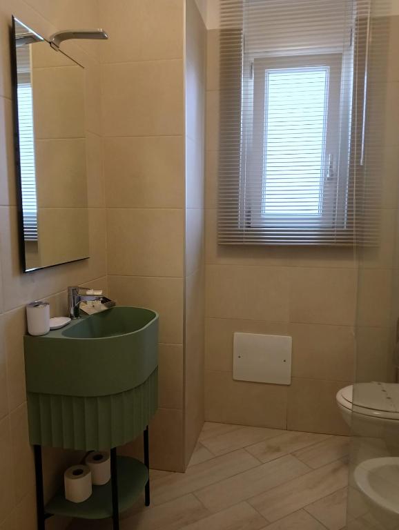 A bathroom at BlueBay Residence Resort