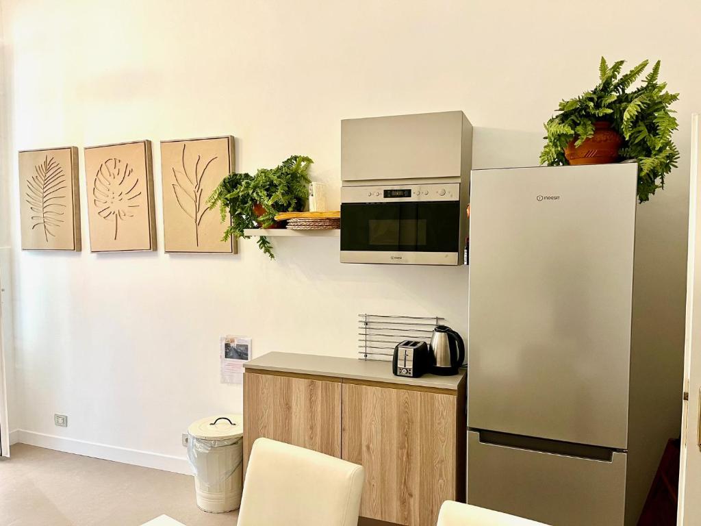 A kitchen or kitchenette at Ciao Bella Apartment