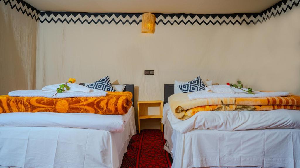 Postel nebo postele na pokoji v ubytování Nomad Camp