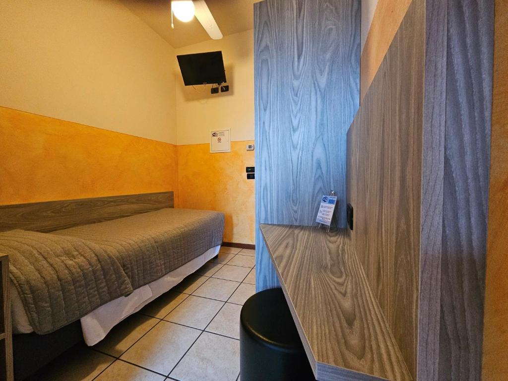 Postel nebo postele na pokoji v ubytování Hotel Euro