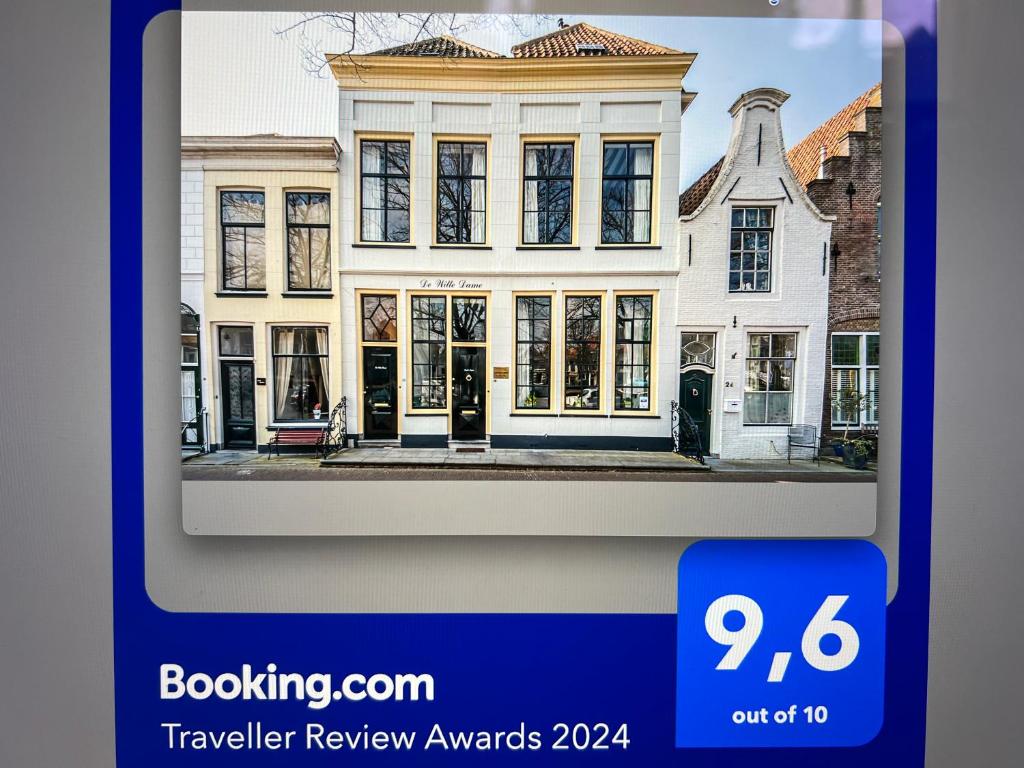 a picture of a house on a cell phone at De Witte Dame in Zierikzee