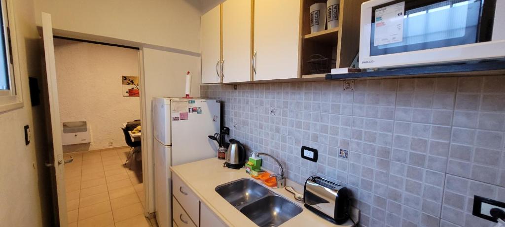 Kuchyň nebo kuchyňský kout v ubytování Departamento ubicación excepcional