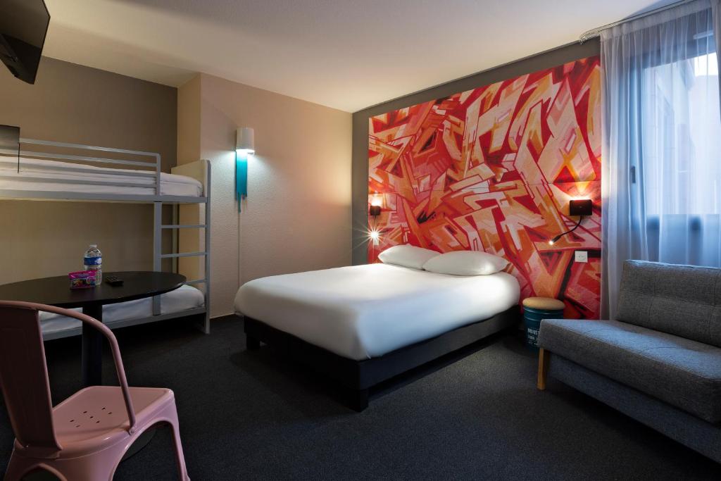 Postel nebo postele na pokoji v ubytování Ibis Styles Toulouse Centre Canal du Midi