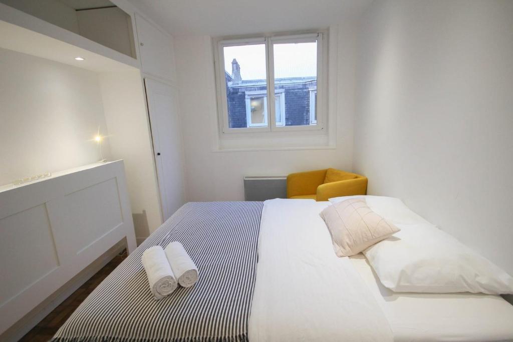 Posteľ alebo postele v izbe v ubytovaní Lille Wazemmes- Appartement avec balcon et vue