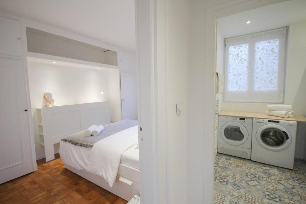 Posteľ alebo postele v izbe v ubytovaní Lille Wazemmes- Appartement avec balcon et vue