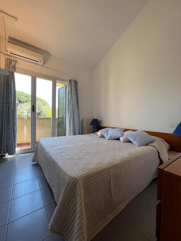 Postel nebo postele na pokoji v ubytování Miramare apartments
