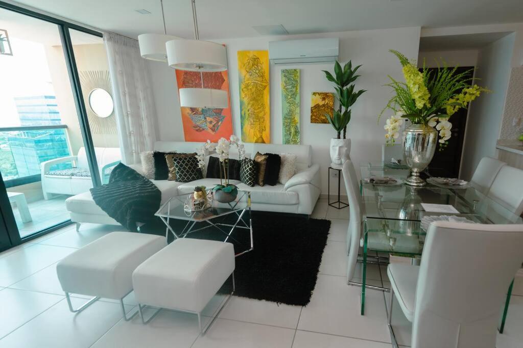 a living room with a couch and a table at Luxury 3BR Apartment in Astria 908 in Tegucigalpa