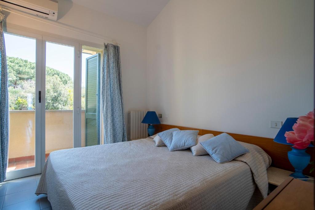 Postel nebo postele na pokoji v ubytování Miramare apartments