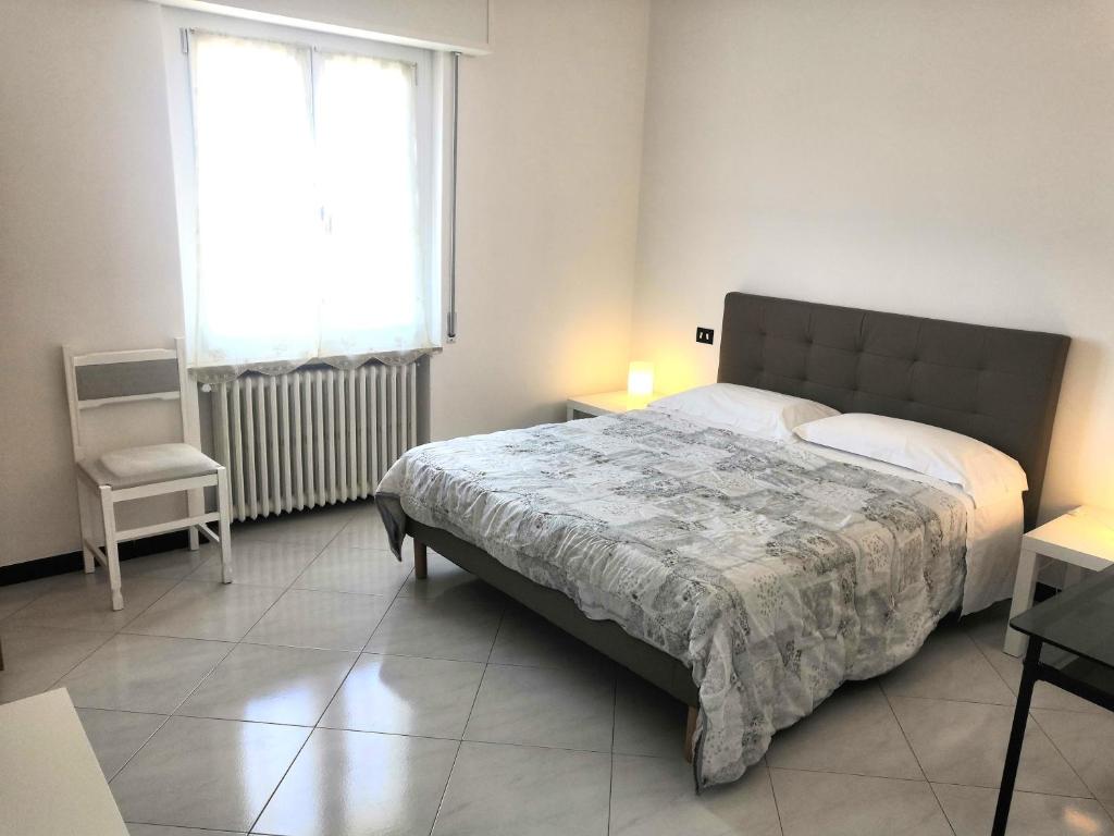 Łóżko lub łóżka w pokoju w obiekcie Al Parco del Castello ampio appartamento