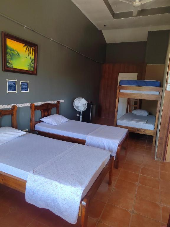 Postel nebo postele na pokoji v ubytování Surá House Corcovado Habitación Big with AC