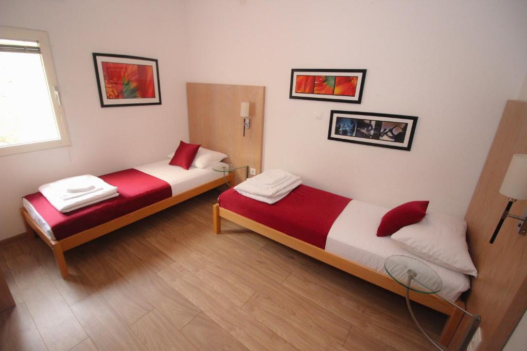 Postel nebo postele na pokoji v ubytování Villa Deny Mostar - with free parking