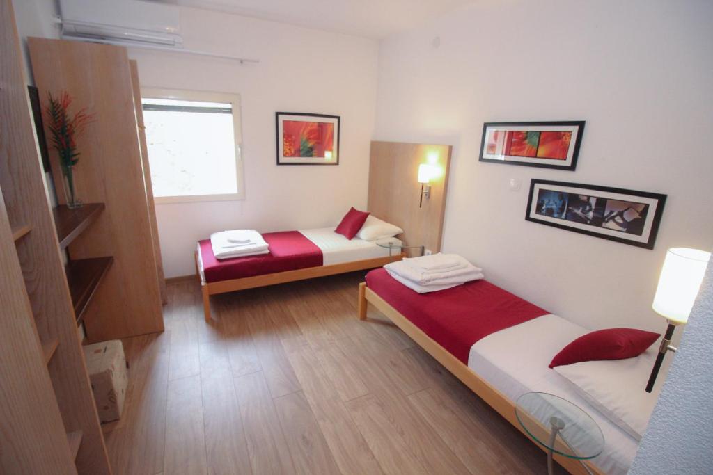 Postel nebo postele na pokoji v ubytování Villa Deny Mostar - with free parking