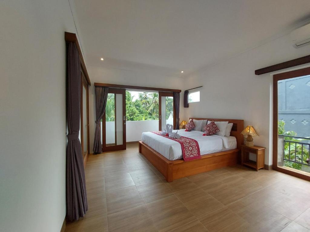 Postel nebo postele na pokoji v ubytování Prema Shiva Suites and Villas by EPS