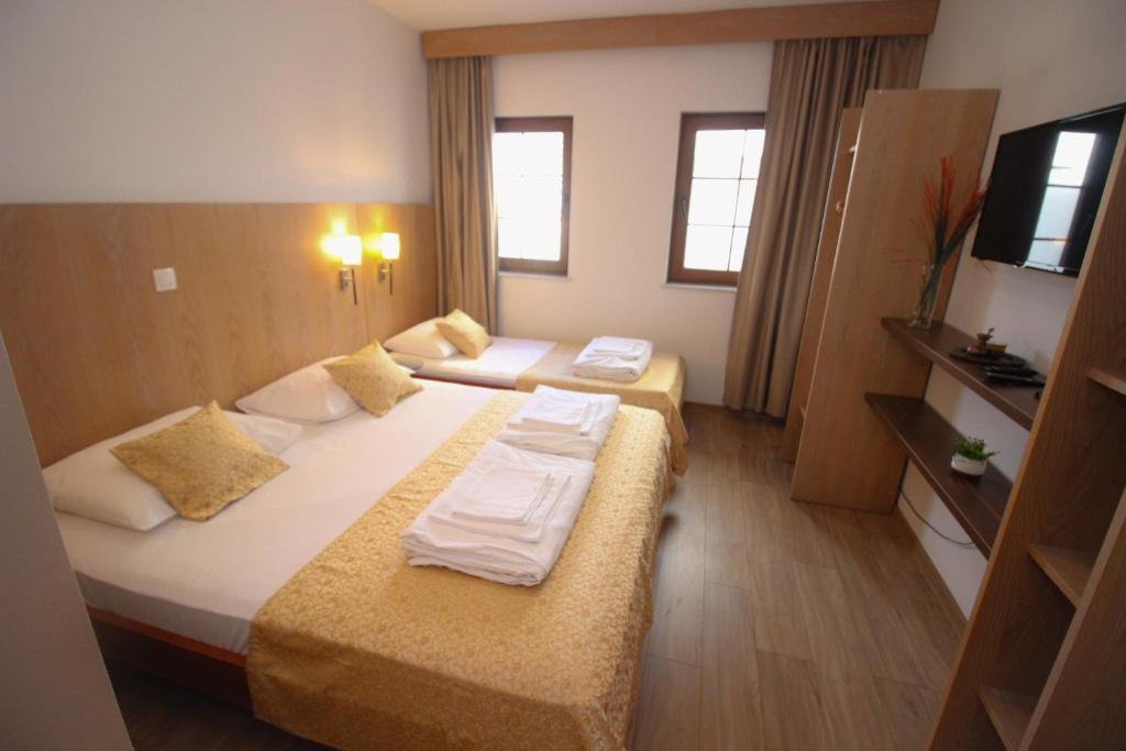 Postel nebo postele na pokoji v ubytování Villa Deny Mostar - with free parking