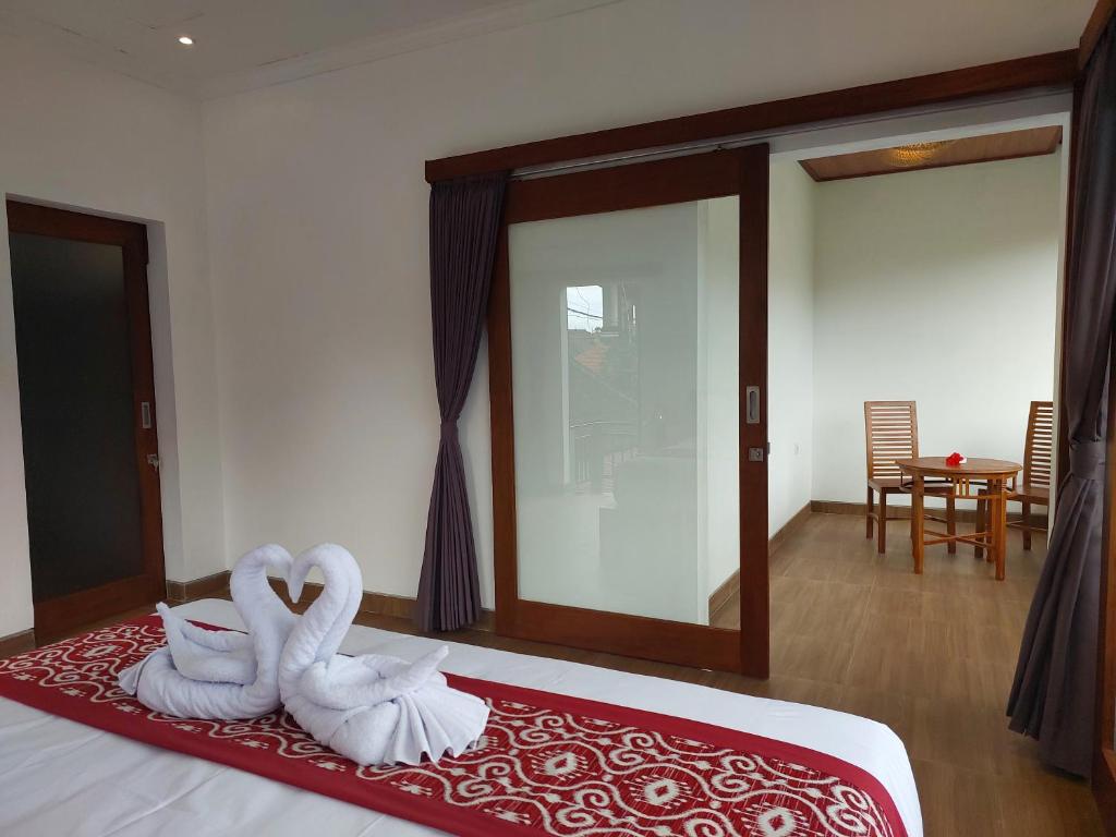 Postel nebo postele na pokoji v ubytování Prema Shiva Suites and Villas by EPS