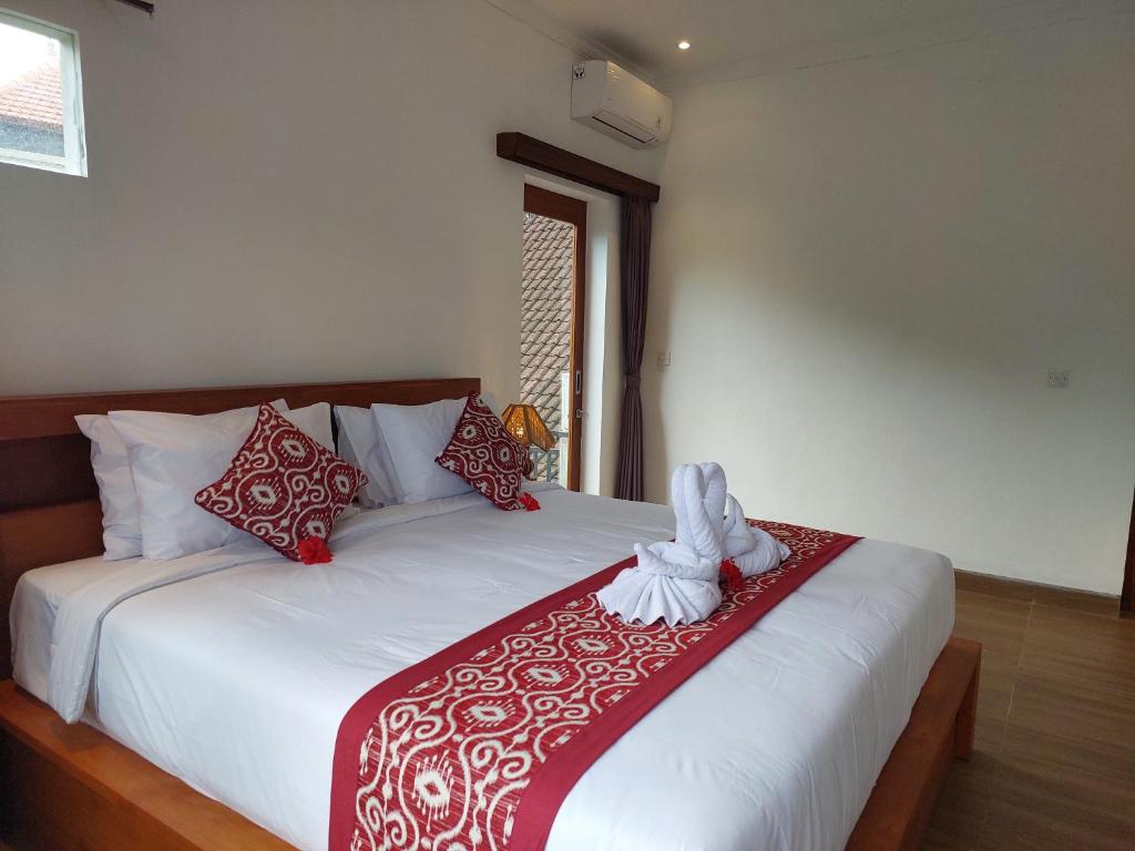 Postel nebo postele na pokoji v ubytování Prema Shiva Suites and Villas by EPS