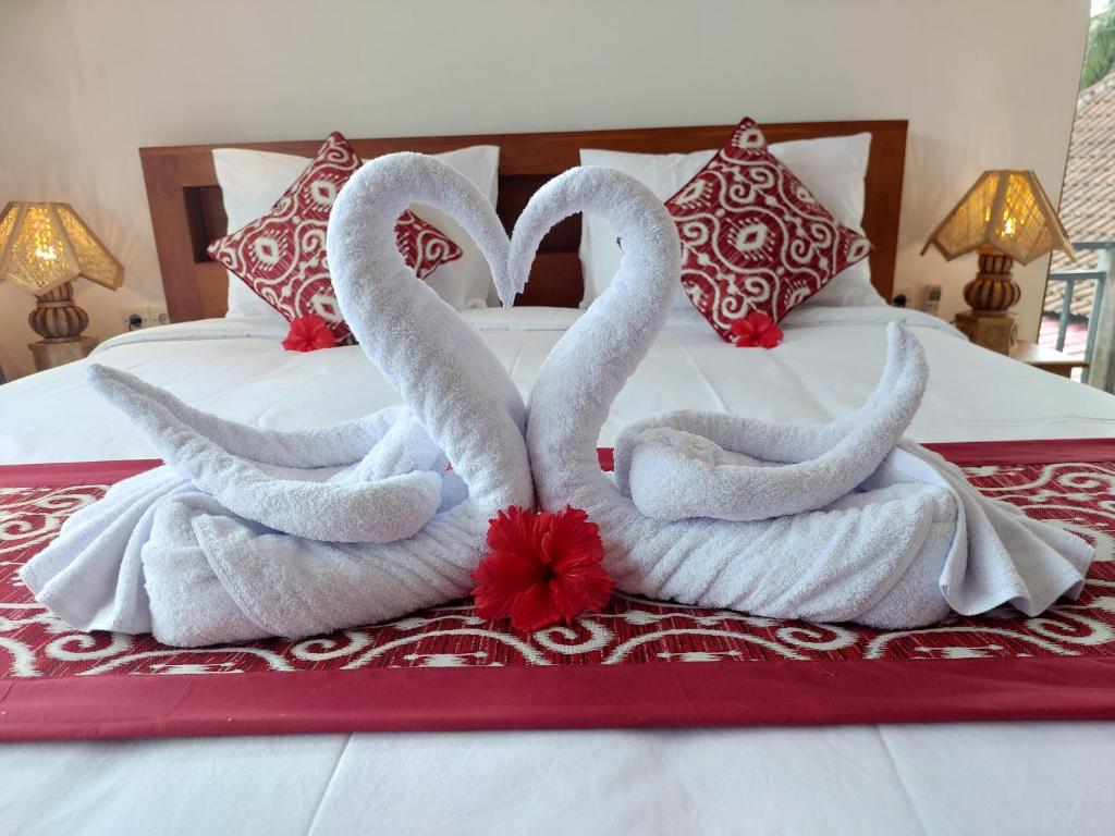 Postel nebo postele na pokoji v ubytování Prema Shiva Suites and Villas by EPS