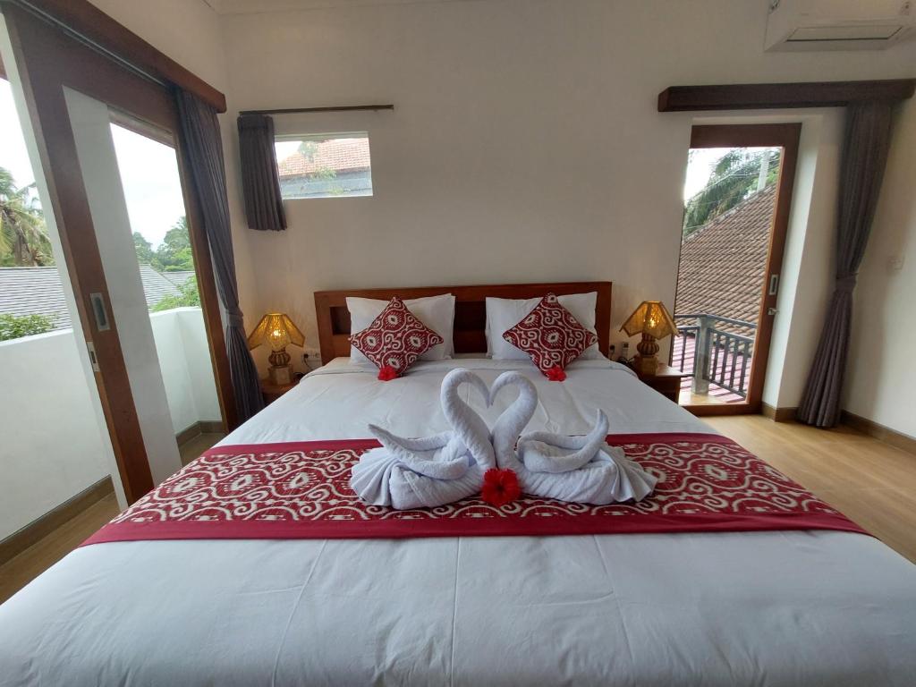 Postel nebo postele na pokoji v ubytování Prema Shiva Suites and Villas by EPS