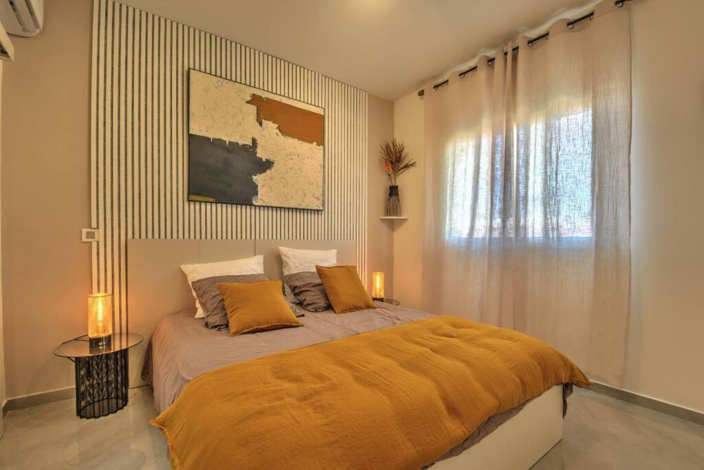 Postel nebo postele na pokoji v ubytování Appartement TalyJay