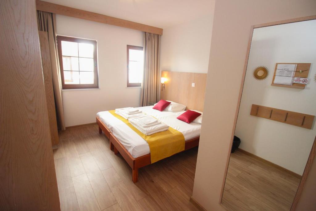 Postel nebo postele na pokoji v ubytování Villa Deny Mostar - with free parking