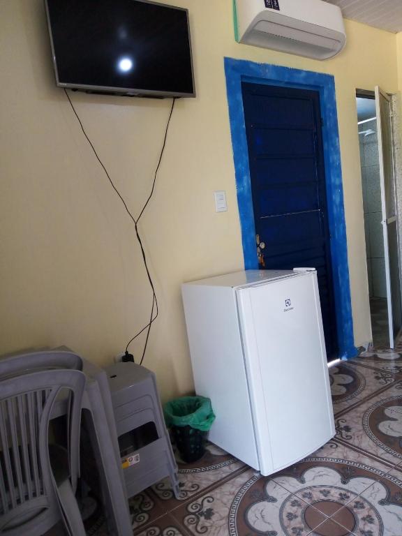 TV a/nebo společenská místnost v ubytování Apartamentos no Farol Velho