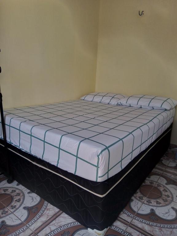 Postel nebo postele na pokoji v ubytování Apartamentos no Farol Velho