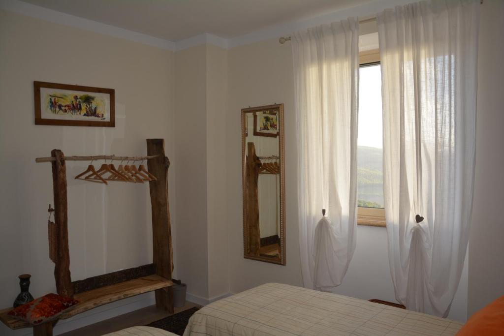 Postel nebo postele na pokoji v ubytování Ai 4 Gelsi B&B