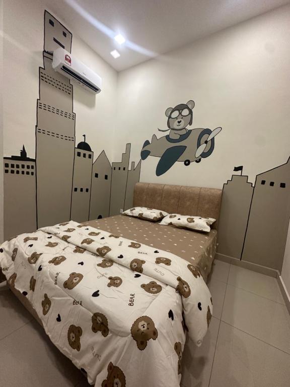 Ліжко або ліжка в номері Pantai Remis Bear Homestay